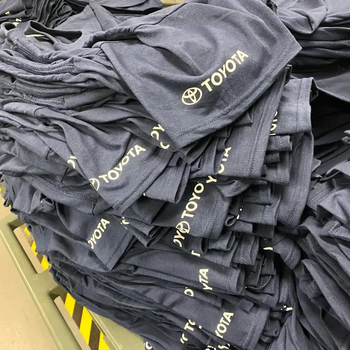 Bulk workwear t-shirt order with company logos — workwear printing Slough