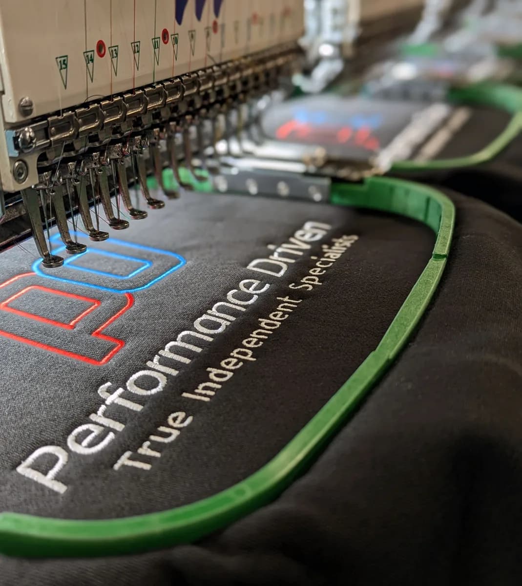 Custom embroidered workwear sample with company logo — embroidery services Slough